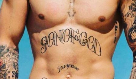 Justin's "Son of God" tattoo