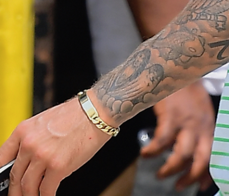 Justin's "Selena Gomez angel" tattoo